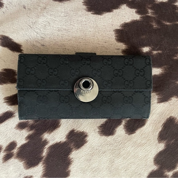 Gucci Handbags - Gucci Black Canvas Bifold wallet
